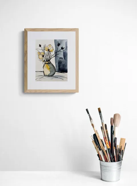 Yellow Flowers in Ceramic Vase Blue Grey